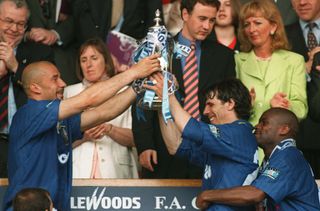 Gianluca Vialli, left, and Gianfranco Zola hold the trophy aloft after Chelsea beat Middlesbrough in the 1997 final