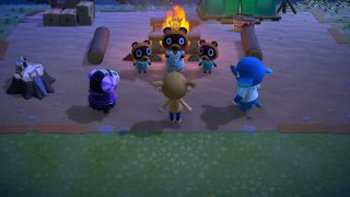 Animal Crossing New Horizons player sitting around campfire with Tom, Timmy, Tommy, and two villagers