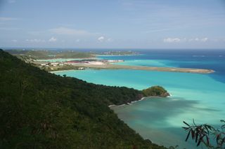 In 2007, Hurricane Dean kicked up sediment in the waters around St. Thomas in the U.S. Virgin Islands. The light areas of water are runoff and resuspended sediments.
