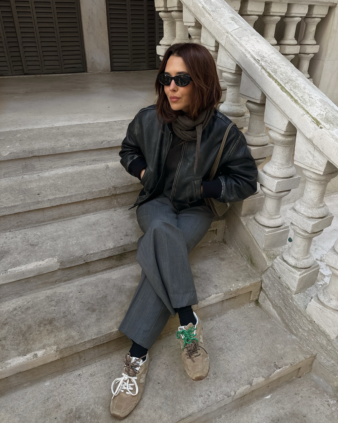 Debora Rosa in an outfit with brown trainers