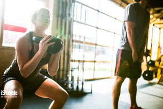 'Exercising with kettlebells gym' by Ryan J Lane