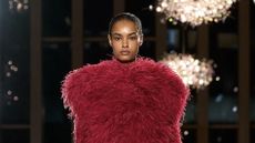 Close-up of model on Michael Kors runway at NYFW