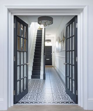 Large open hallway with tiled floor in Georgian home