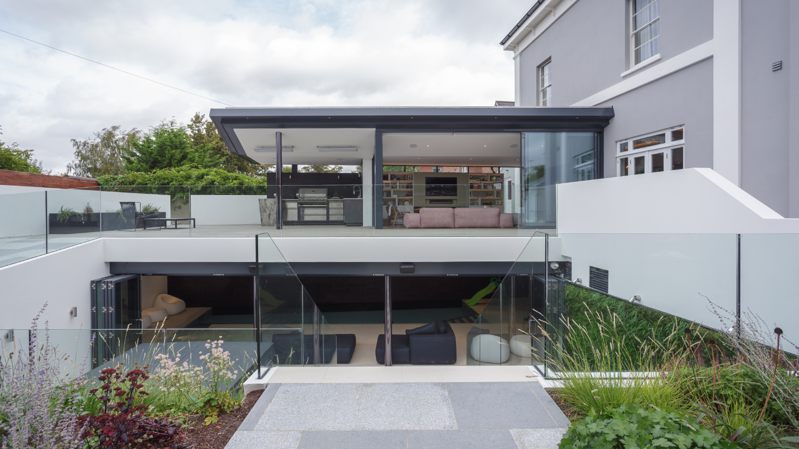 exterior shot of basement conversion with pool