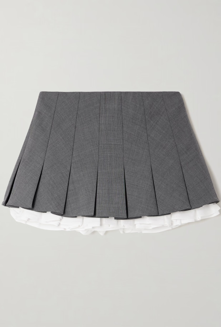 An image of a Shushu Tong mini skirt, a staple of preppy fashion. 