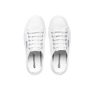 A pair of white low trainers from Superga.