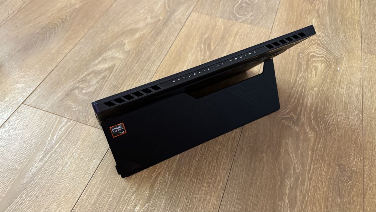 Asus ROG Flow Z13 gaming tablet on wooden surface