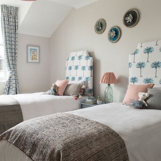 bedroom with twin upholstered beds