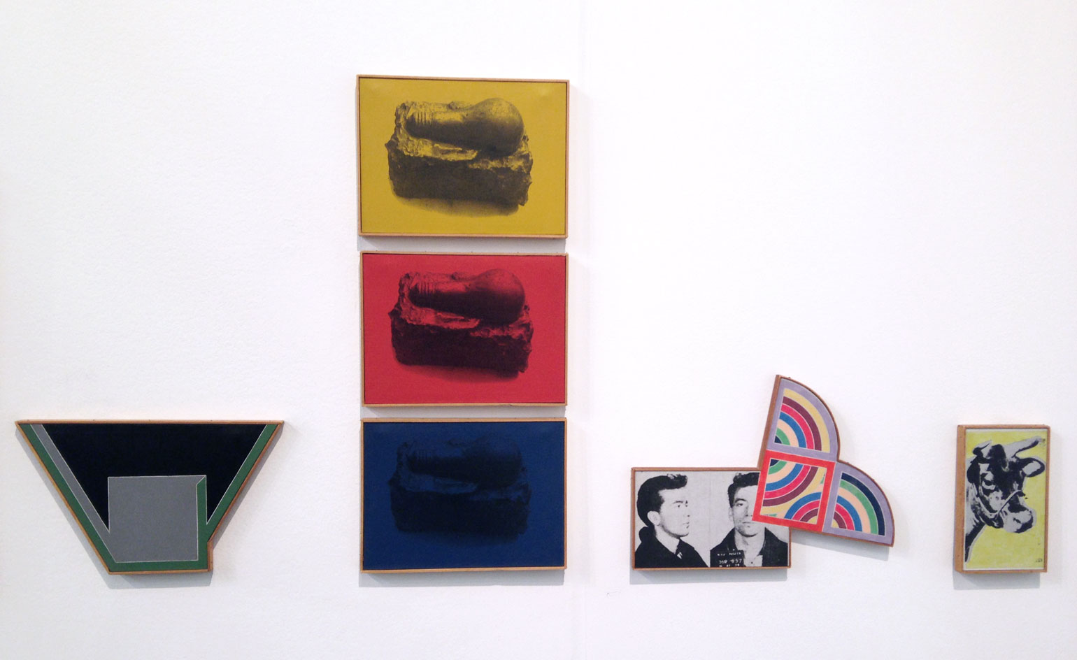 Various prints on a white wall
