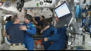 European astronaut Samantha Cristoforetti arriving at the International Space Station with her Crew-4 team mates.