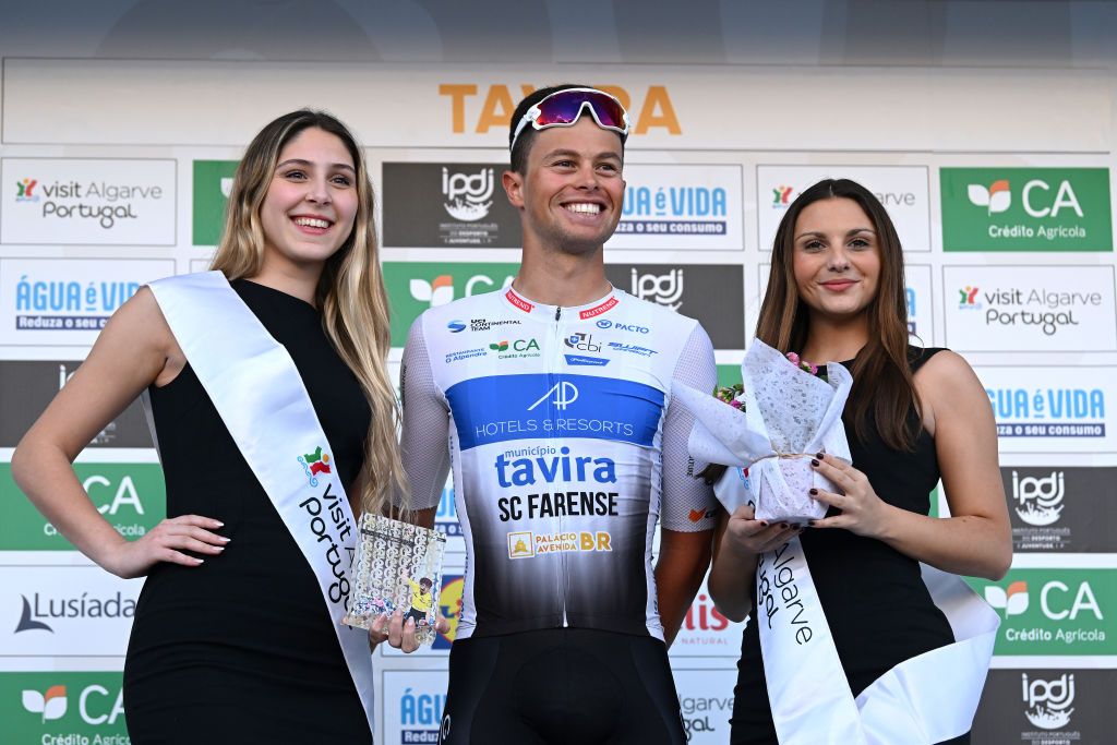 TAVIRA PORTUGAL FEBRUARY 16 Carlos Miguel Salgueiro of Portugal and Team APHotels Resorts Tavira SC Farense celebrates at podium as most combative rider prize winner during the 50th Volta ao Algarve em Bicicleta 2024 Stage 3 a 1922km stage from Vila Real de Santo Antonio to Tavira on February 16 2024 in Tavira Portugal Photo by Dario BelingheriGetty Images