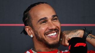 Lewis Hamilton of Great Britain and Scuderia Ferrari talks in the Drivers Press Conference during day one of F1 Testing at Bahrain International Circuit on February 18, 2026 in Bahrain, Bahrain. 