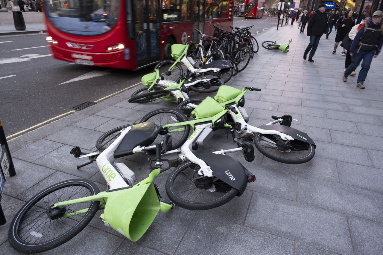 Lime bikes on the floor of a London street