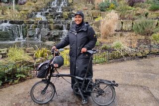 Image shows woman wearing Adidas cycling hijab