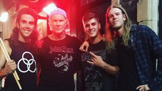 Chad Smith poses with Australian musicians