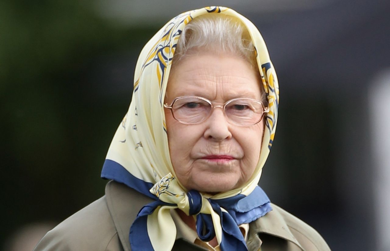 Queen Elizabeth II walks through the grounds of Windsor Castle during Windsor Horse Show on May 11, 2011 in Windsor, England