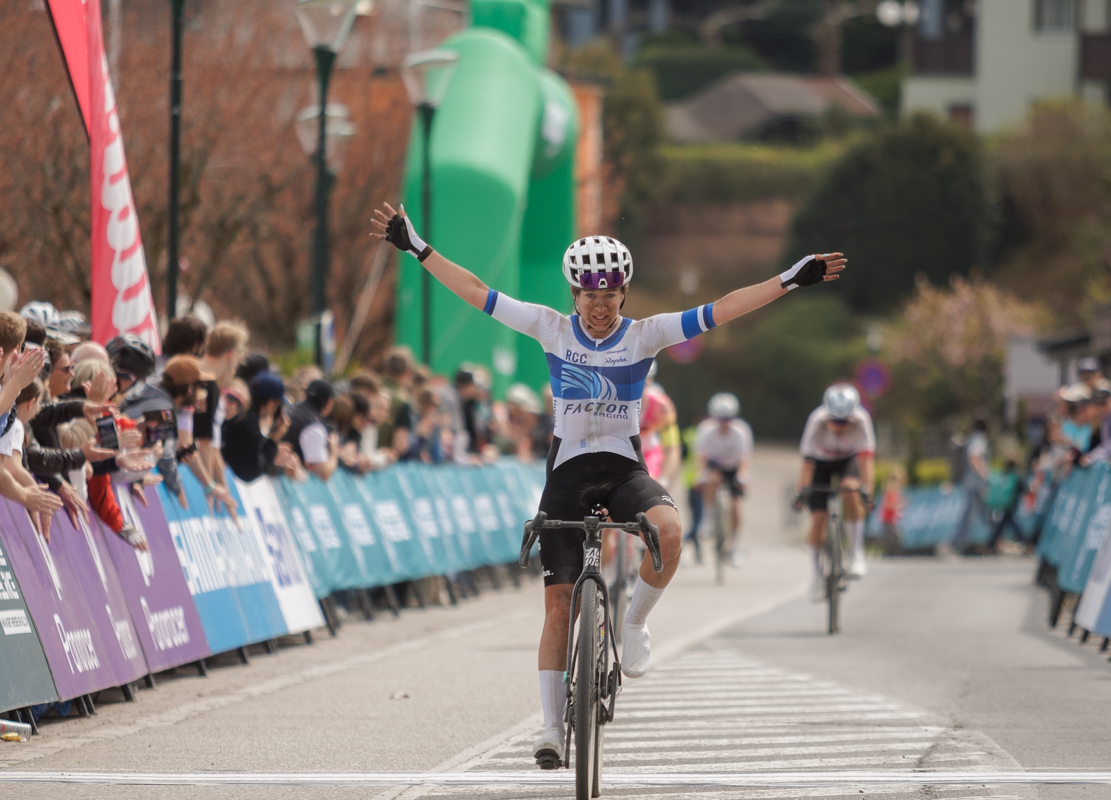 Australian Nicole Frain rides solo across the line in Velden, Austria for elite women's title at W&ouml;rthersee Gravel