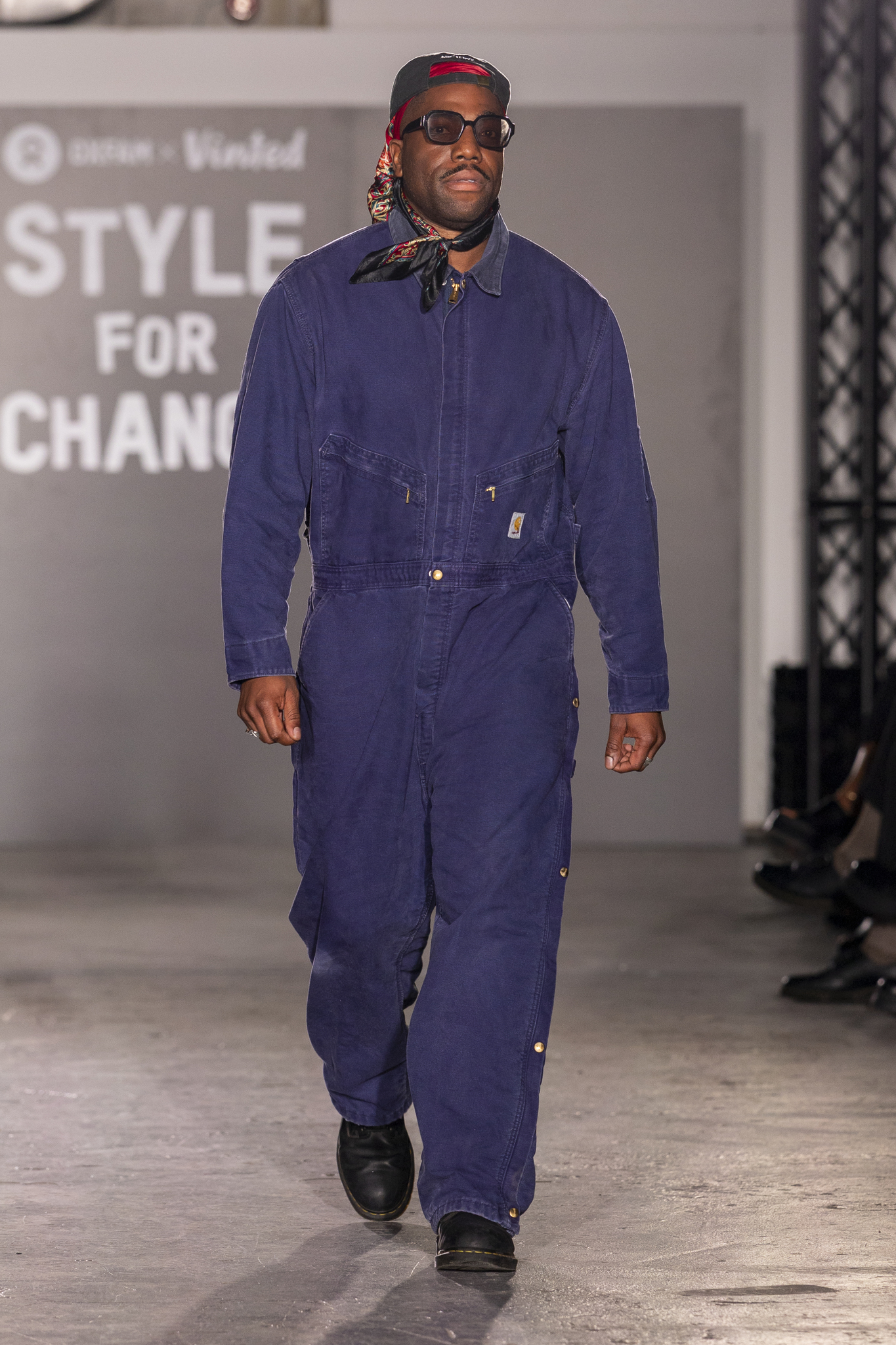 Man walking down the runway at Oxfam London Fashion Week
