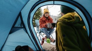 two campers in winter