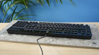 A black Corsair K55 RGB Pro wired gaming keyboard with rubber dome switches