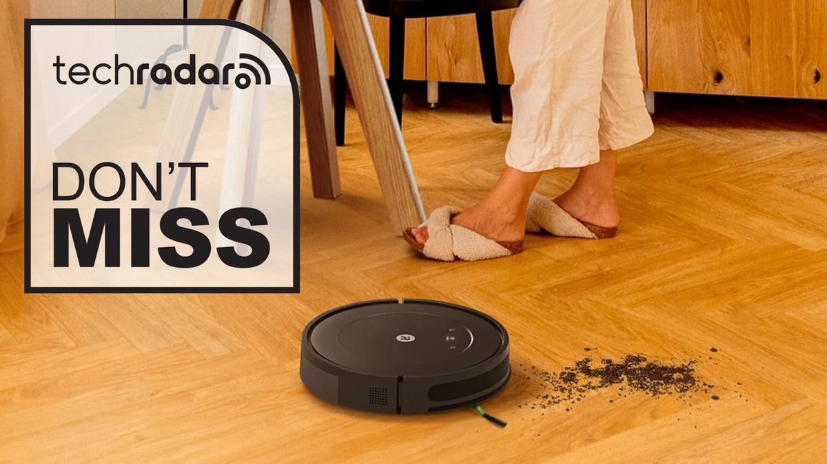 Roomba Essential robot vacuum on a wooden floor, with &#039;Don&#039;t miss&#039; graphic overlaid