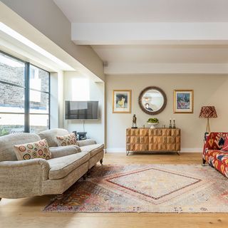 living room with sofa set and carpet floor