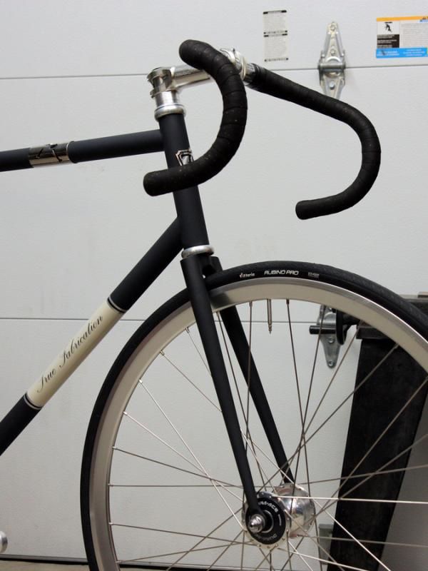 Simple lines adorn the front end of True Fabrication's track bike.