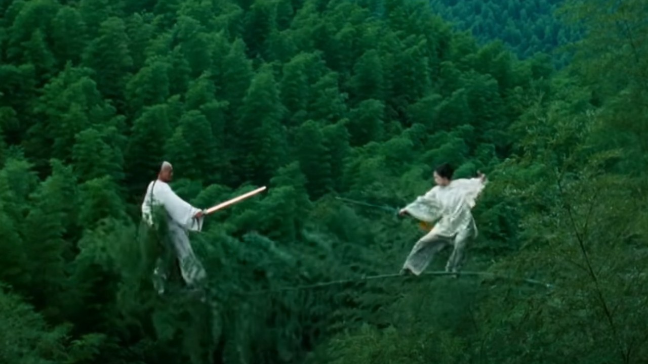 Chow Yun-fat standing in a tree in Crouching Tiger, Hidden Dragon