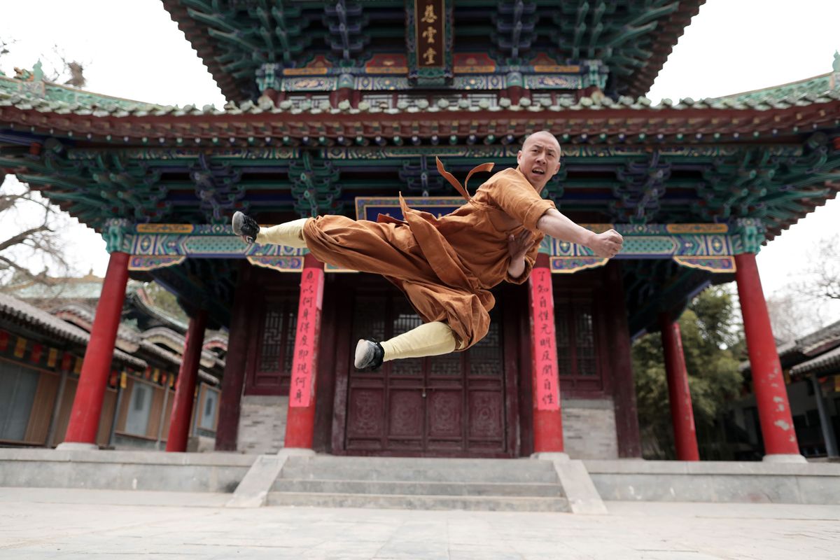 Trainee Monk Yandian practises Kung Fu at the Shaolin Temple, China