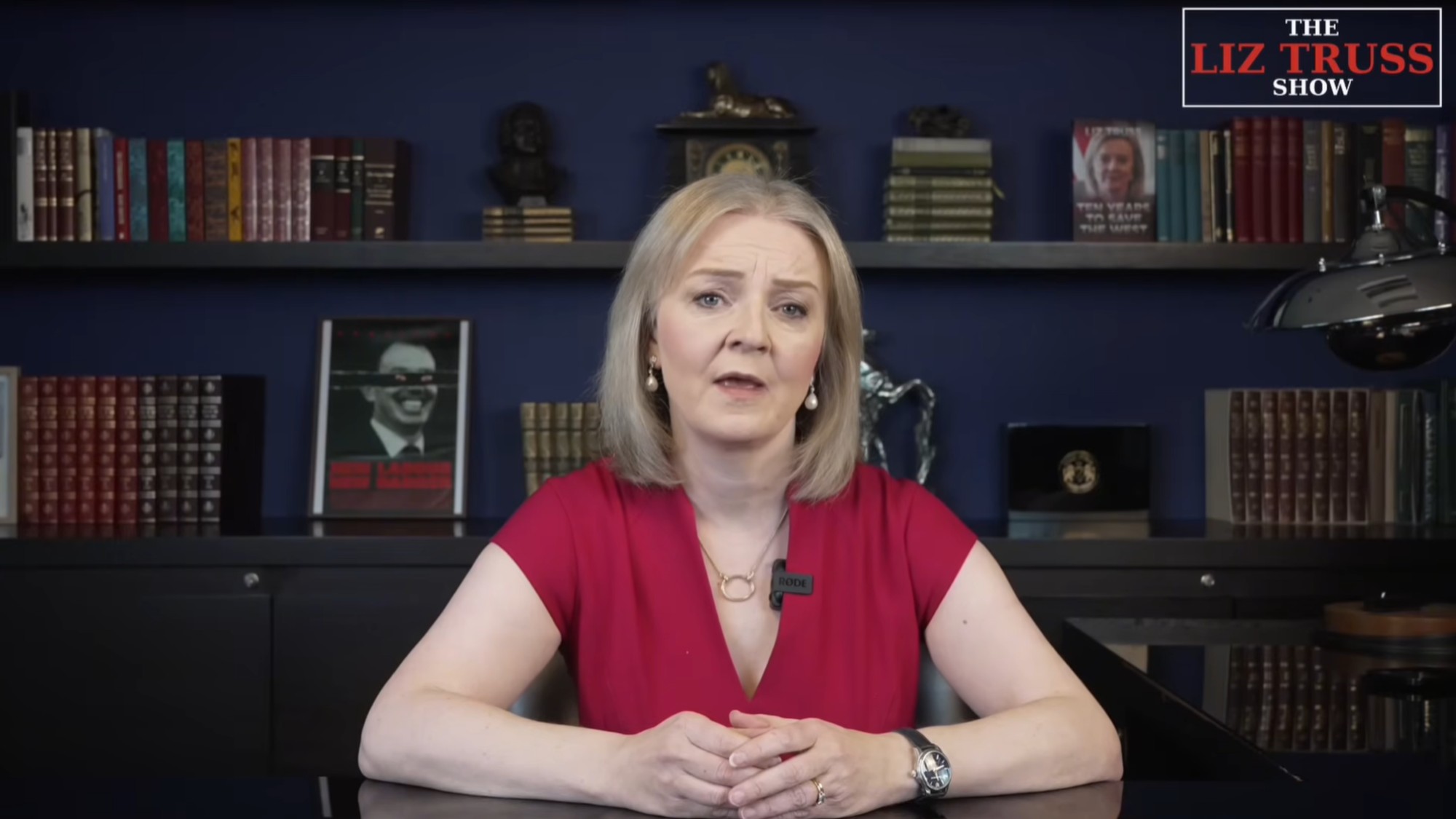 Liz Truss facing the camera and speaking during The Liz Truss Show