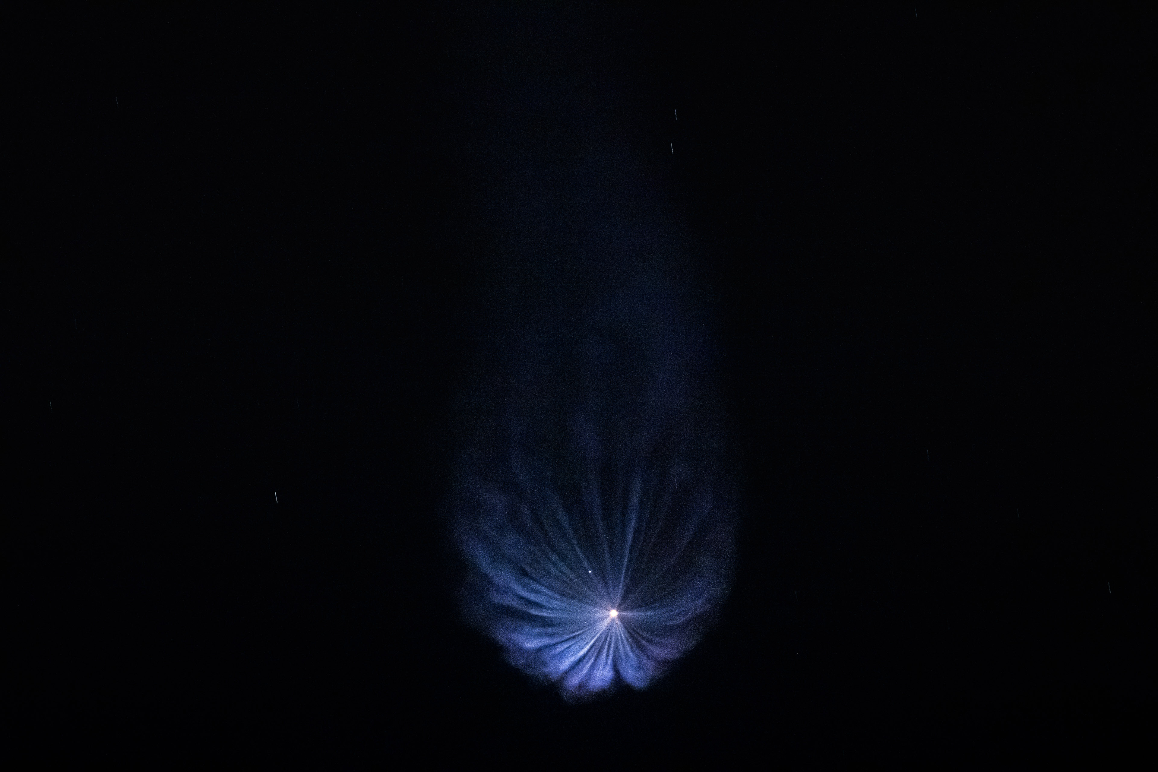 SpaceX's Falcon 9 rocket produced a floral pattern in the Florida sky as it climbed aloft with 53 Starlink satellites on Feb. 2, 2023.