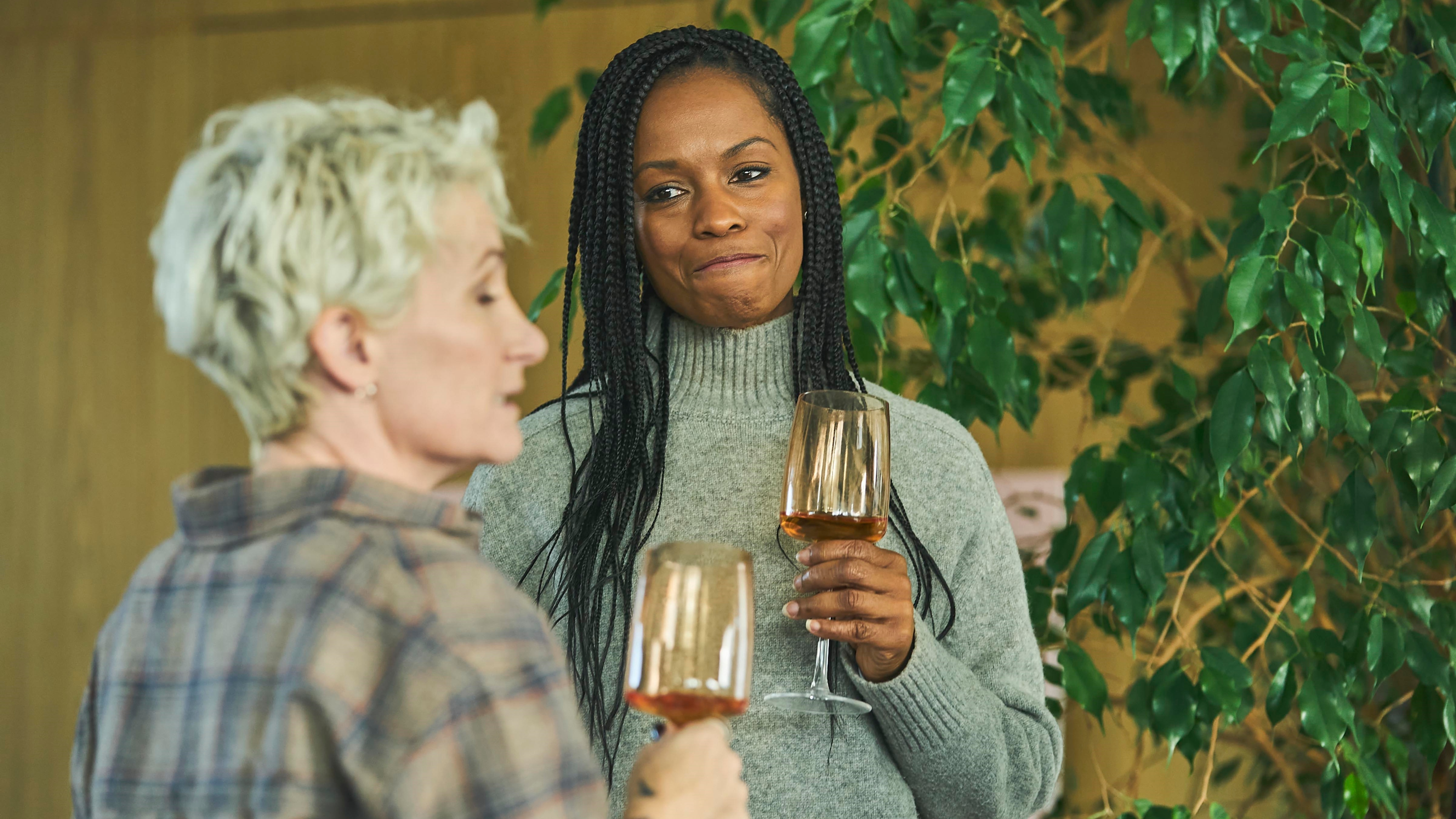 Two mums drinking wine in The Rumour