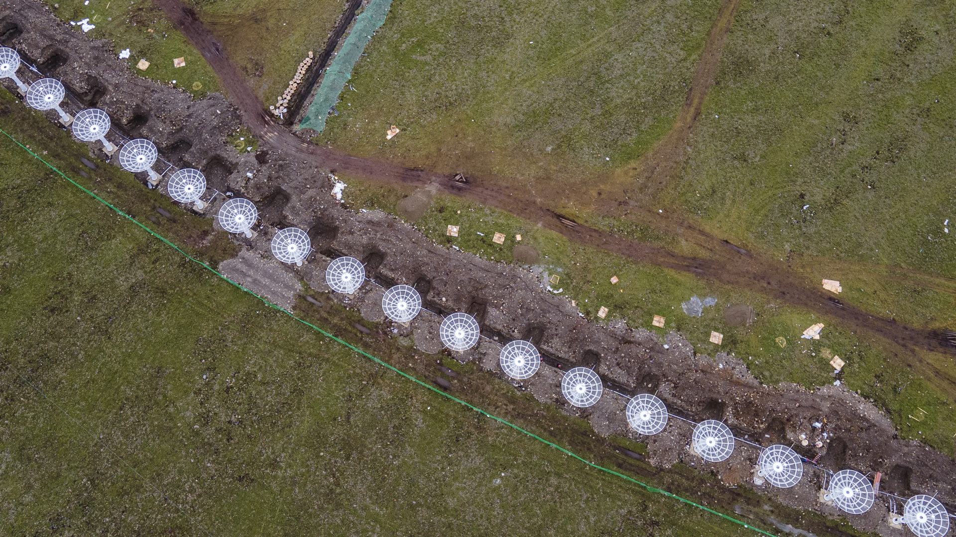 Aerial view of the parabolic antennas in a circle at the construction site of the Solar Radio Telescope (the Meridian Project phase II) in Daocheng County on June 29, 2022 in Garze Tibetan Autonomous Prefecture, Sichuan Province of China. 