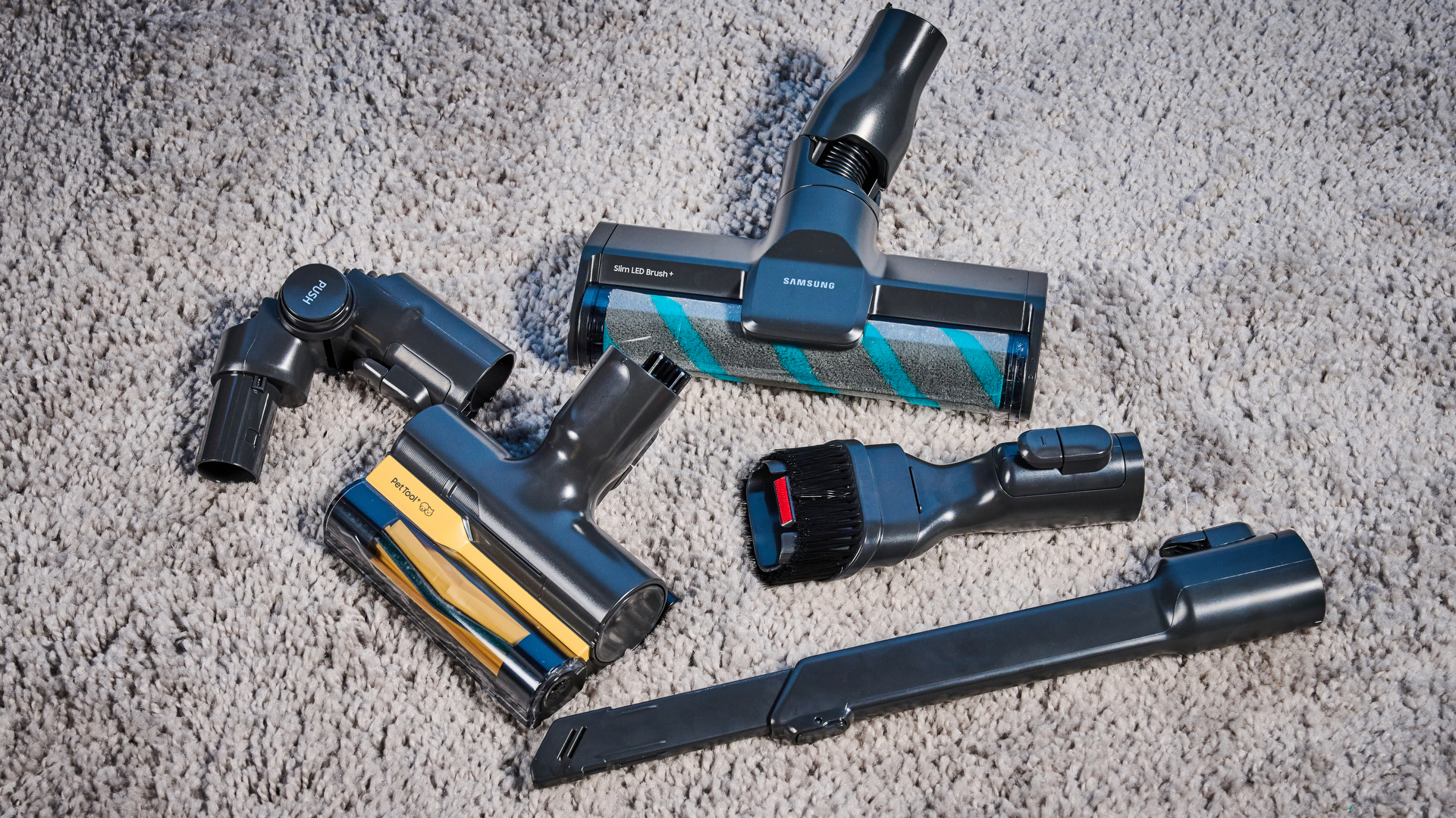 the samsung bespoke jet AI vacuum cleaner in mint green against a blue background, showing its ability to clean carpets and baseboards, as both a stick and a handheld