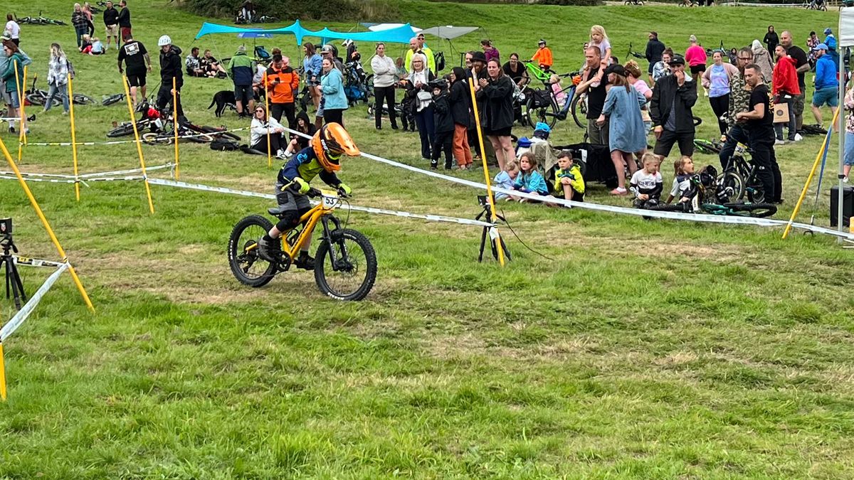 A young MTB rider in a race