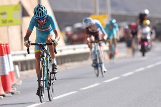Vincenzo Nibali puts some distance into a chasing Romain Bardet