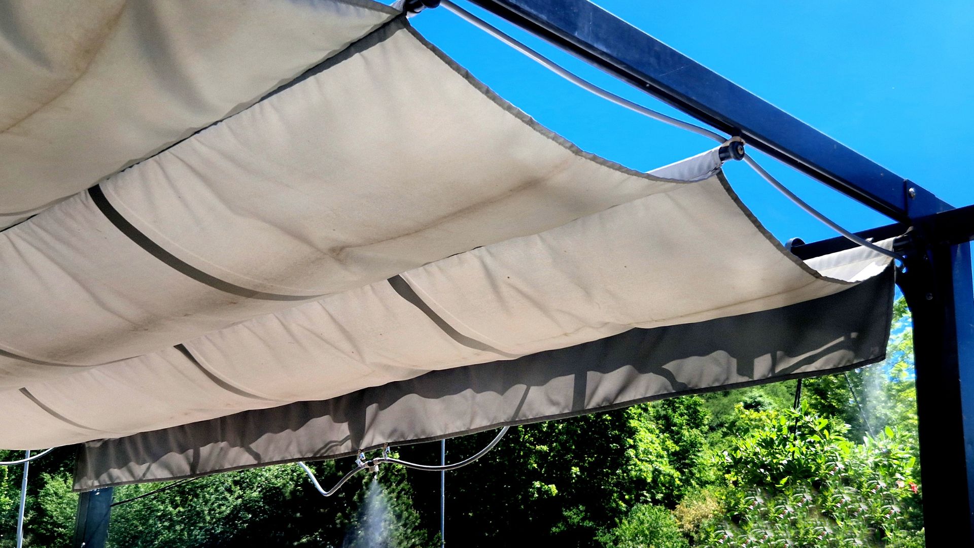picture of pergola with retractable fabric shade