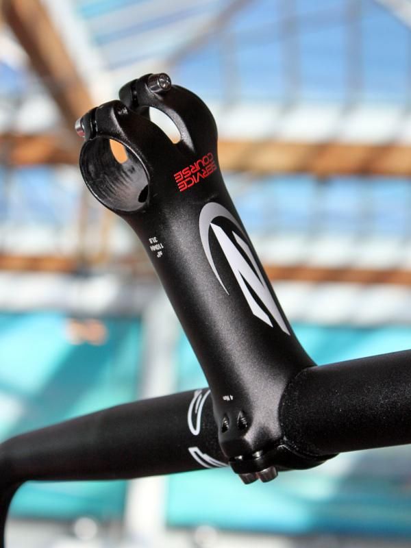 Steerer and bar clamp edges are carefully radiused to relieve point stress on fragile carbon components.