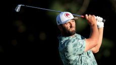 Jon Rahm of Spain plays his second shot on the 15th hole during the second round of the 2024 Masters.