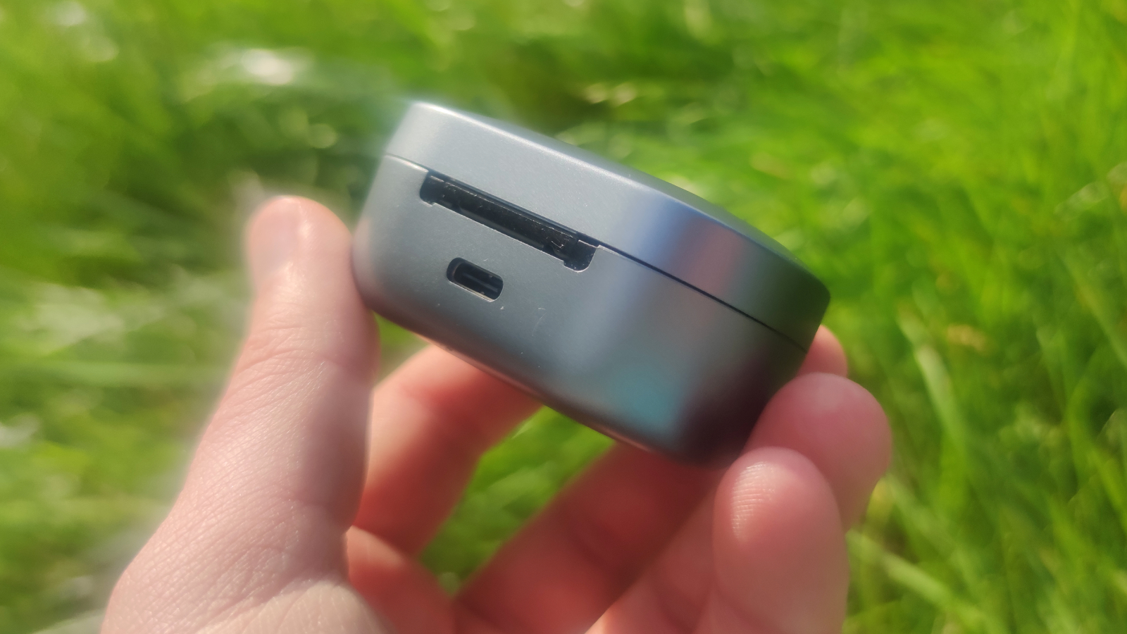 The FiiO FW3 on a grassy backdrop.