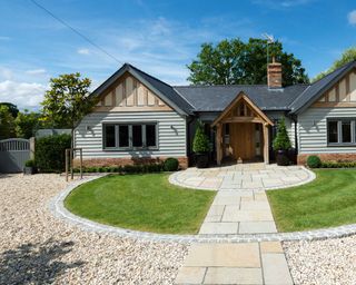 curved gravel driveway and lawn