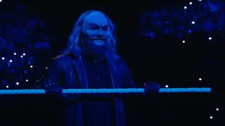 Bo Dallas as Uncle Howdy standing on the ring apron in WWE as seen in Bray Wyatt: Becoming Immortal