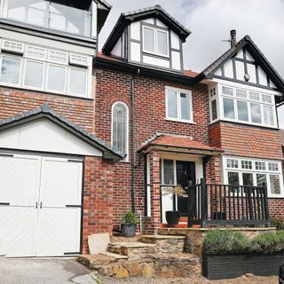 Red brick house with garage