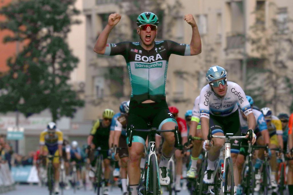 ROQUETAS DE MAR SPAIN FEBRUARY 16 Arrival Pascal Ackermann of Germany and Team Bora Hansgrohe Celebration Elia Viviani of Italy and Team Cofidis Solutions Credits during the 33rd Clsica de Almera 2020 a 1876km stage from Roquetas de Mar to Roquetas de Mar ClasicaAlmeria on February 16 2020 in Roquetas de Mar Spain Photo by Gonzalo Arroyo MorenoGetty Images