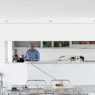 kitchen with men and white walls