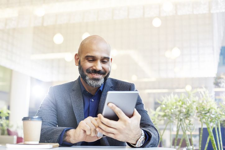 Business man holding a tablet