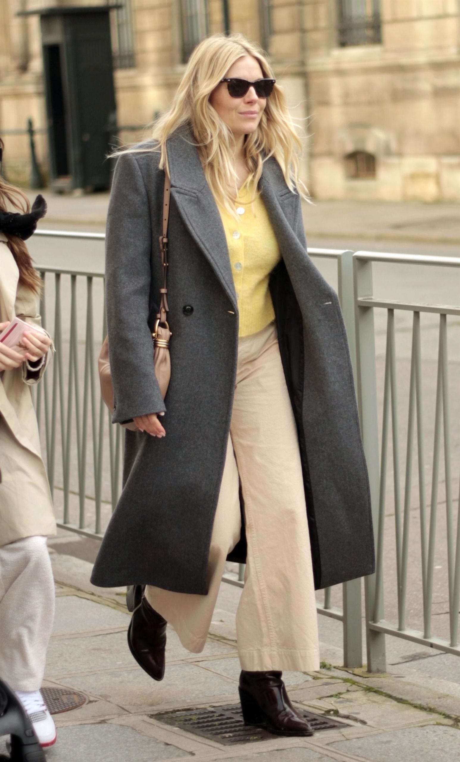 Sienna Miller wore a wool coat from Mango in Paris in 2024