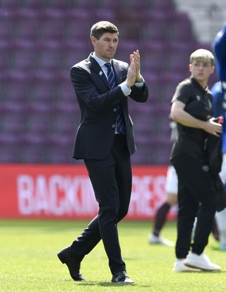 Rangers manager Steven Gerrard applauds the fans after his side's victory