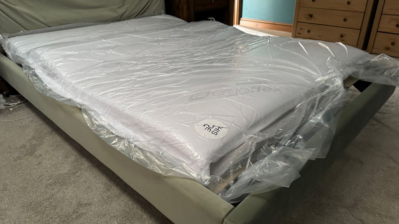 Unpacking the ErgoFlex 5G mattress in our tester's bedroom