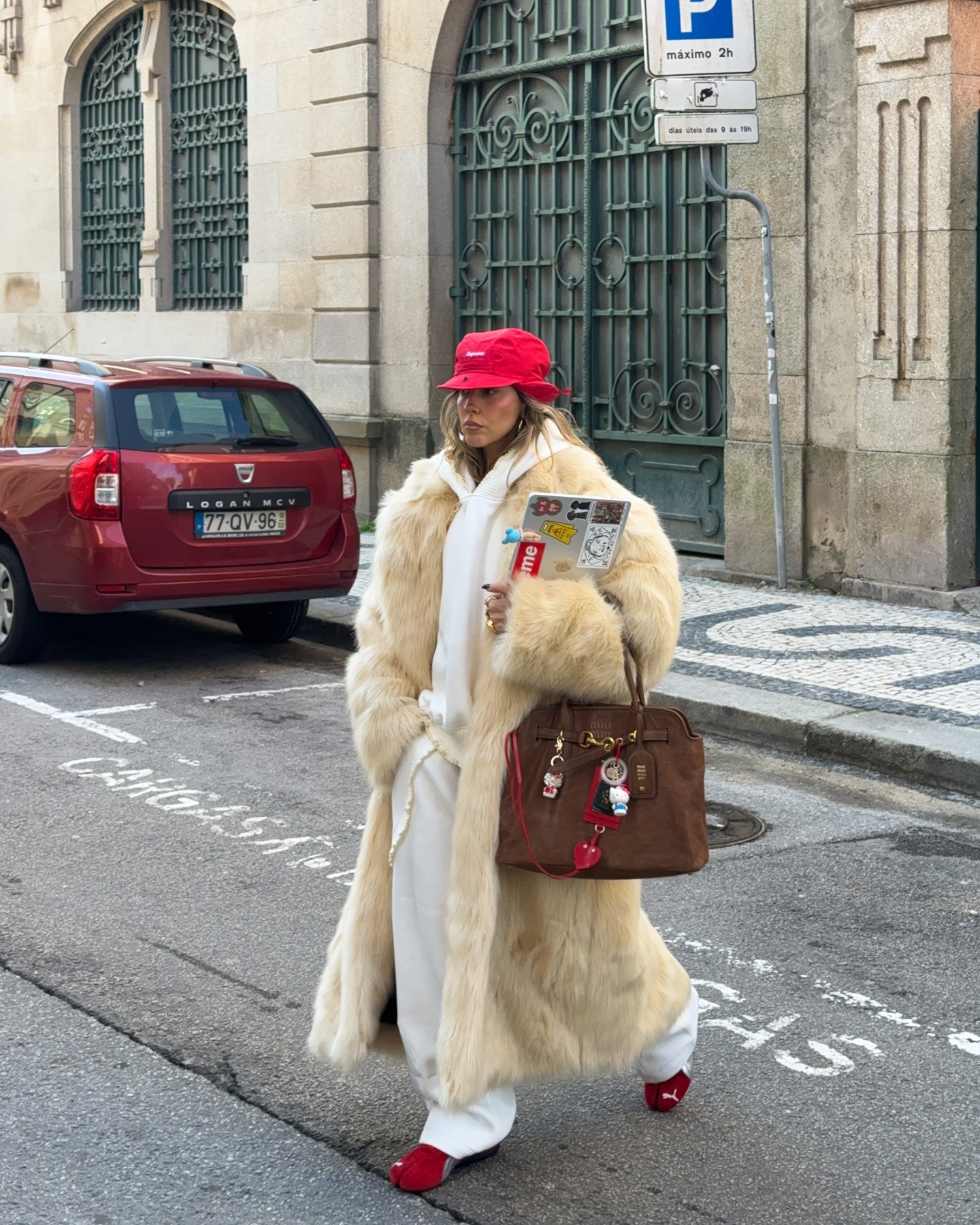 Fashion person Sofia Mcoelho wears one of the faux fur trends 2025.